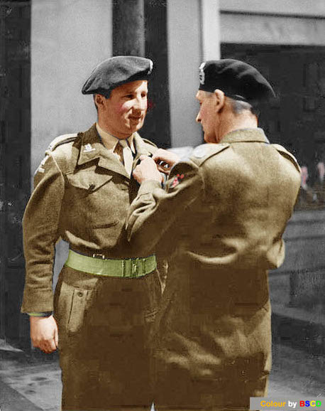 Field Marshal Montgomery pins a Military Cross on Bill Rathdonnell at Schleswig
on 12 August 1945. As chance would have it, Montgomery descended from the McClintock
family, as did Field Marshal Alexander. Colour by BSC