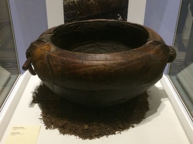 The Altartate Cauldron in the Prehistoric Ireland exhibition at the National Museum of Ireland in Dublin. The find suggests the continuation of certain Later Bronze Age traditions into the Early Iron Age although its form differs from that of Later Bronze Age cauldrons. A band of ornament below the rim, which may be compared closely with that found on certain Early Iron Age spears, suggests that the wooden cauldron may have been carved during the 2nd century BC. See also image on this page of WIlliam Mealiff.

(With thanks to Matthew Gallagher).
