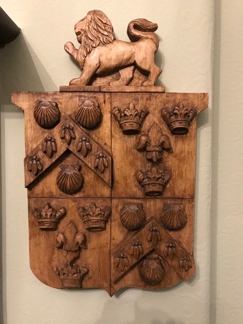 A lime-wood rendition of the coat of arms, which was made in 2019 by Sarah Goss. (With thanks to Alex Watson)