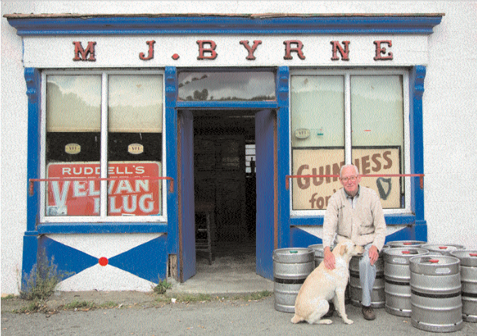 Pa Byrne, with dog Sandy, inherited the pub from his mother’s family in the 1980s. Photo: James Fennell.