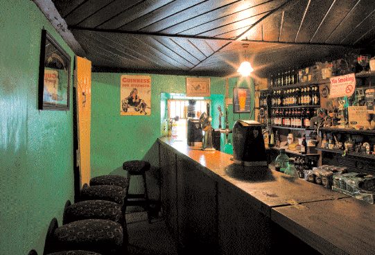 Floral stools run the length of the narrow, green bar room, encouraging intimate banter between customer and landlady. Photo: James Fennell.