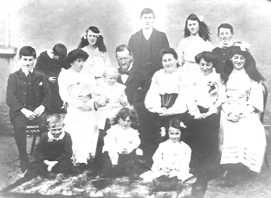 The Gaffer and his family, Ballyknockan, c. 1903-4
Back: Patrick, Lil, John, Nan, Bob.
Middle: William, Bride, William (The Gaffer), Mary (née Brady), Marcella, Mary
Sitting: Joe, Jim, Kitty
