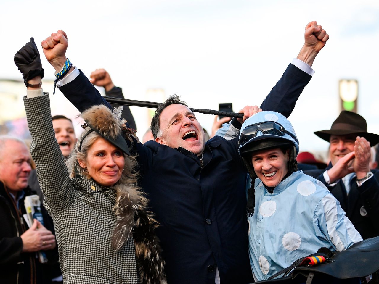 Trainer Henry de Bromhead, his wife Heather, left, and winning jockey Rachael Blackmore after Honeysuckle won the Mares' Hurdle. Photo by Seb Daly/Sportsfile.