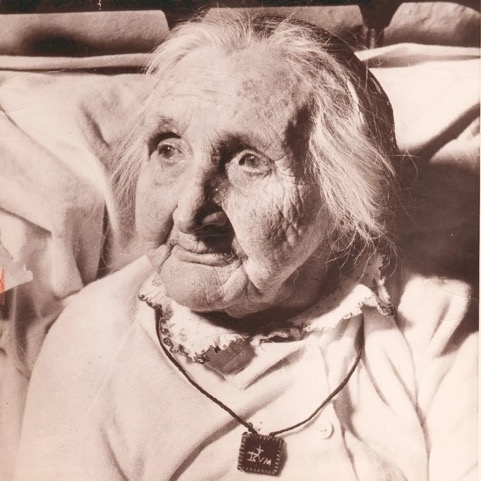 I was sent this photograph of Mary Ann McNally (1847-1956) in 2024 by her great-grandson Harry Carson, Cornwall. She was born at Cross, a crossroads near Louisburgh, County Mayo, between Killeen Church and the Clapper Bridge near Roonagh Quay. She somehow survived An Gorta Mór, married and had six children, some of whom emigrated to Massachusetts.